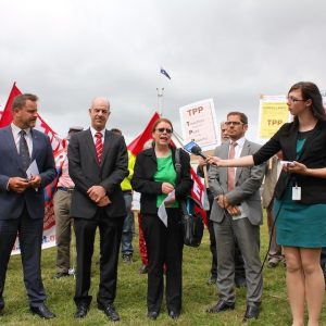  MPs from Greens and Labor, academics, Medecins Sans Frontieres and the general public gather outside Parliament House Canberra on 20 Oct 2014 to protest the proposal that Australia signs the TPP agreement.